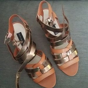 Beautiful strappy metallic wedge sandals